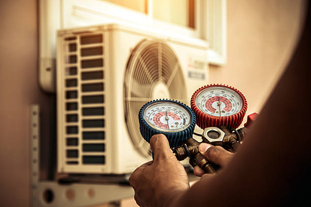 Professional Heat Pump Repair technician working in Milton, GA